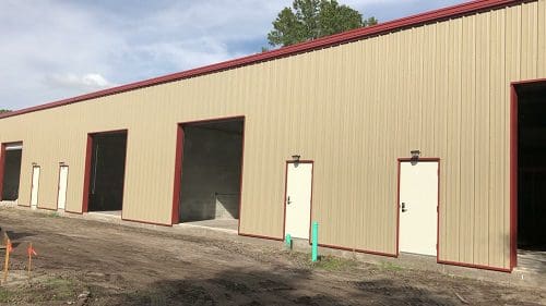 Large warehouse with open entrances