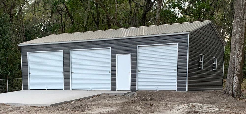 Triple-door garage on concrete slab