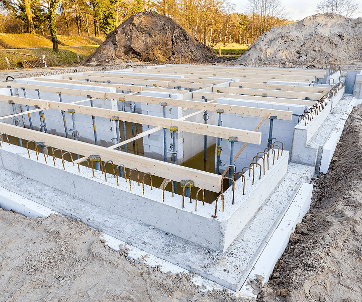 Building foundation with wooden beams