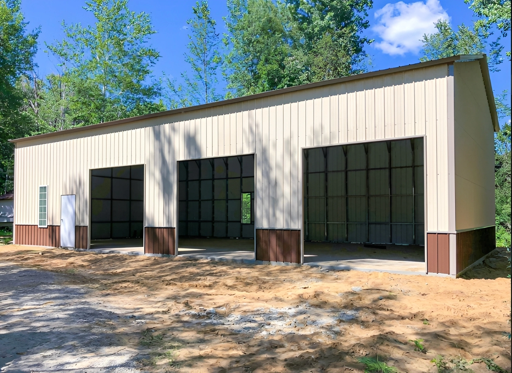 Metal storage building in wooded area
