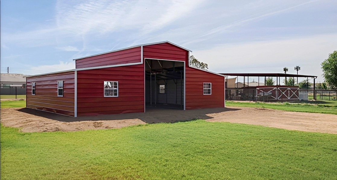 Large red barn and green lawn