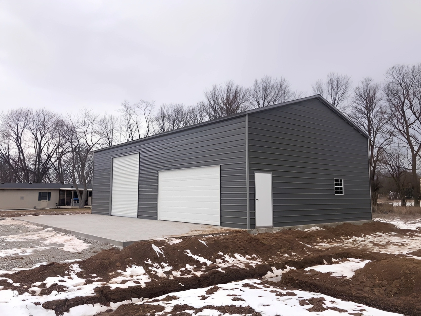 Large industrial shed in winter setting