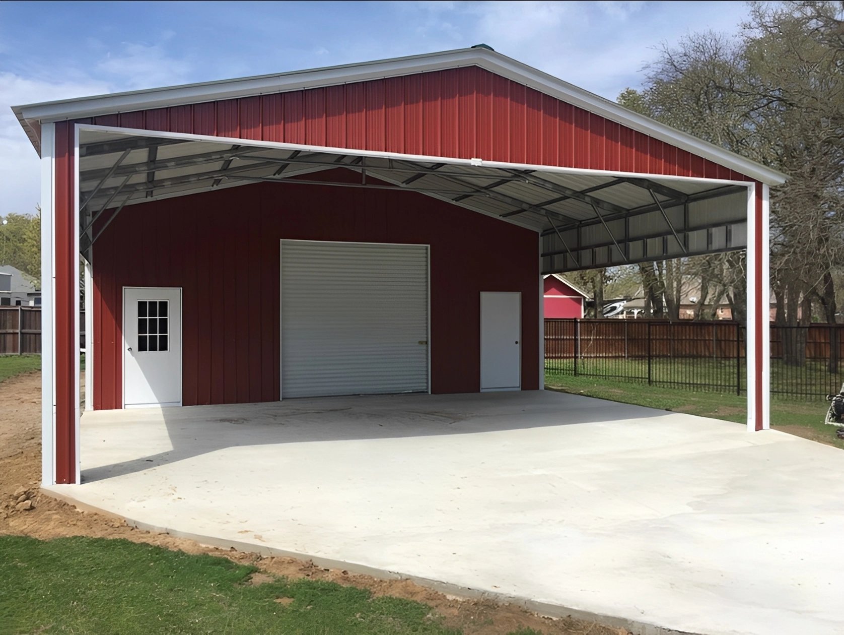 Red agricultural building under blue sky