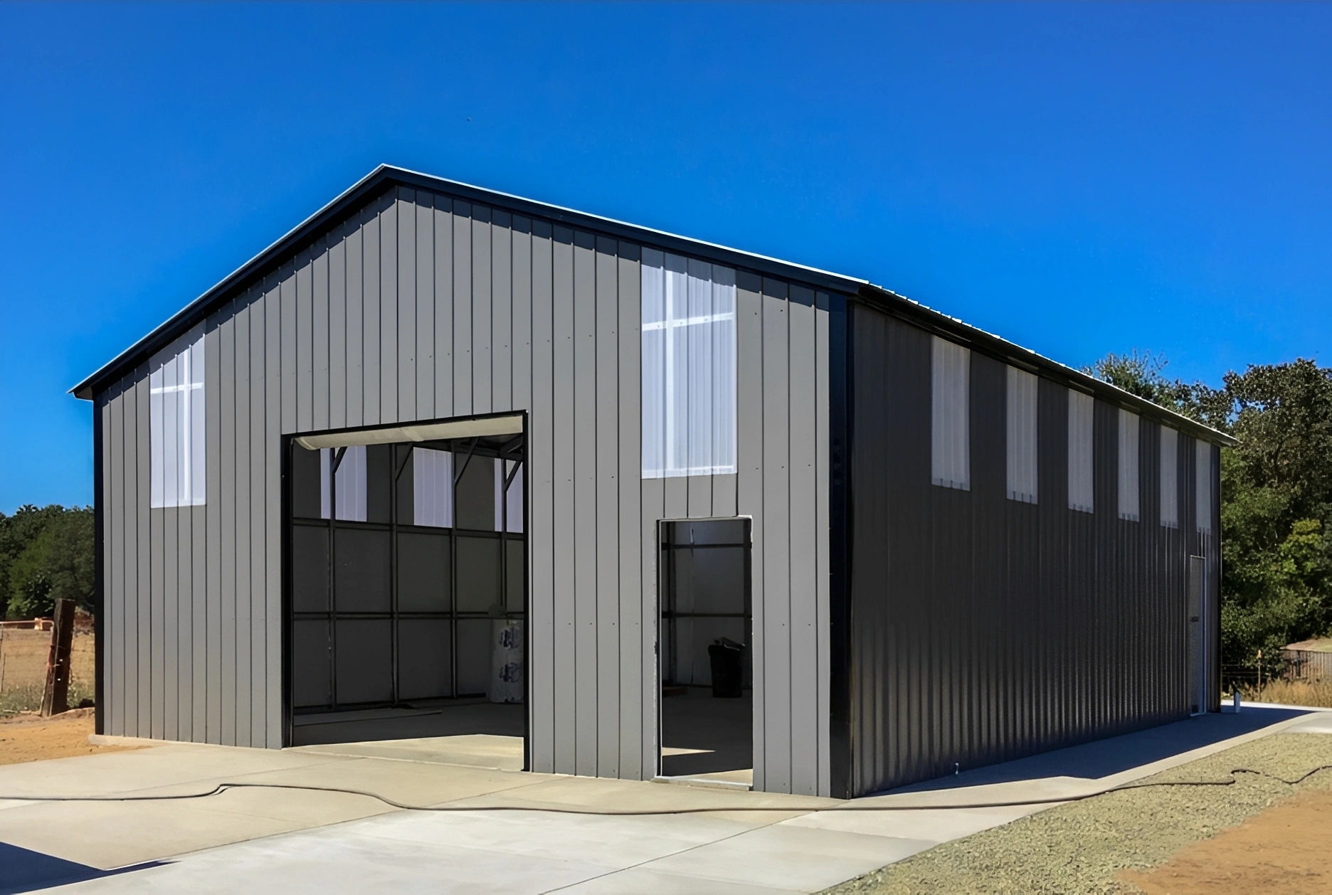 Metal construction warehouse in sunny setting