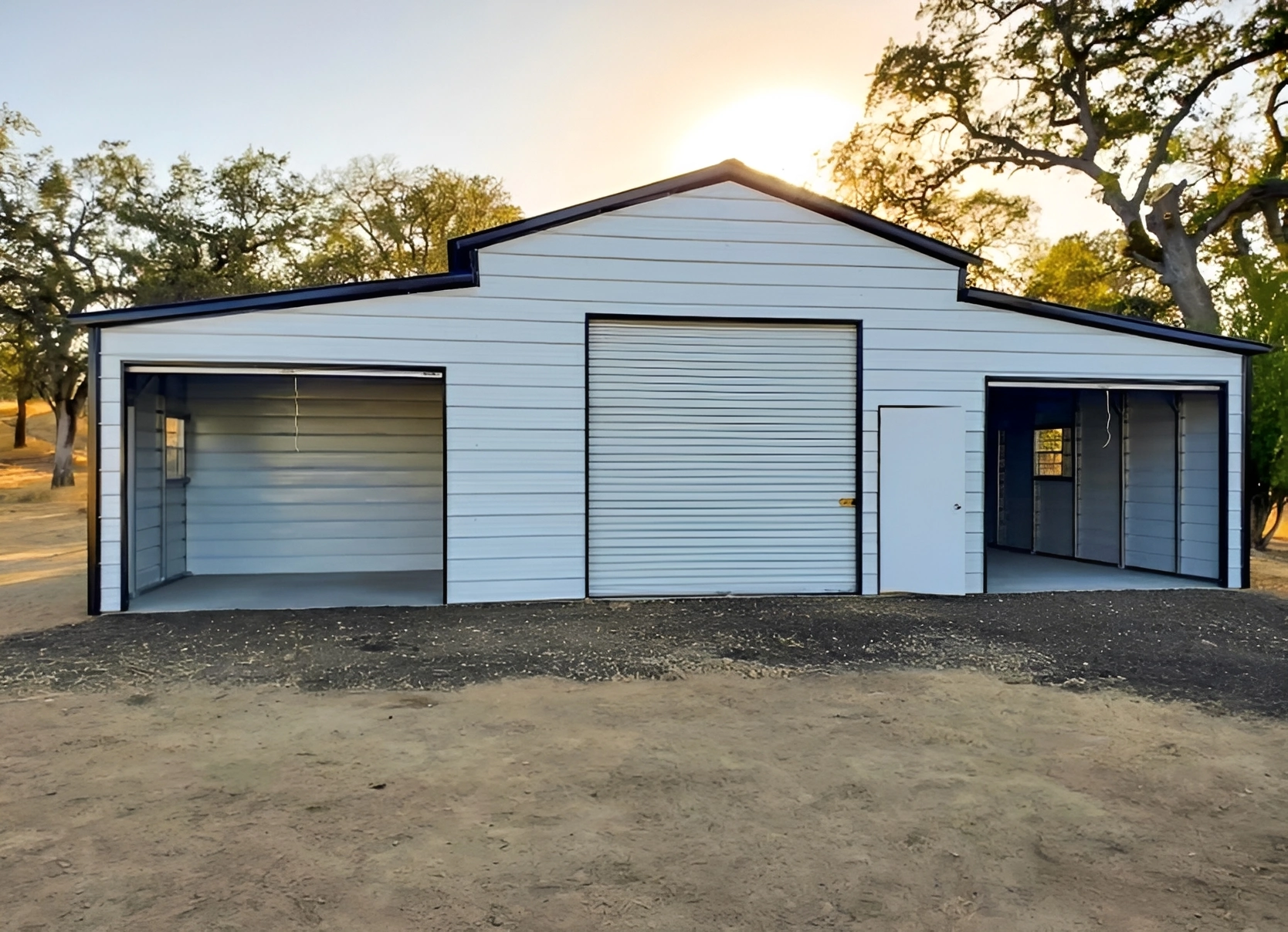 White metal barn with large doors