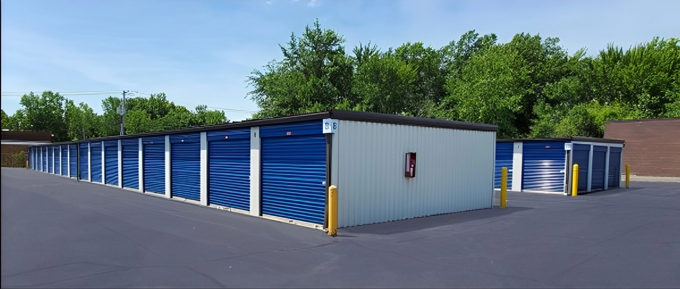 Row of storage units near trees