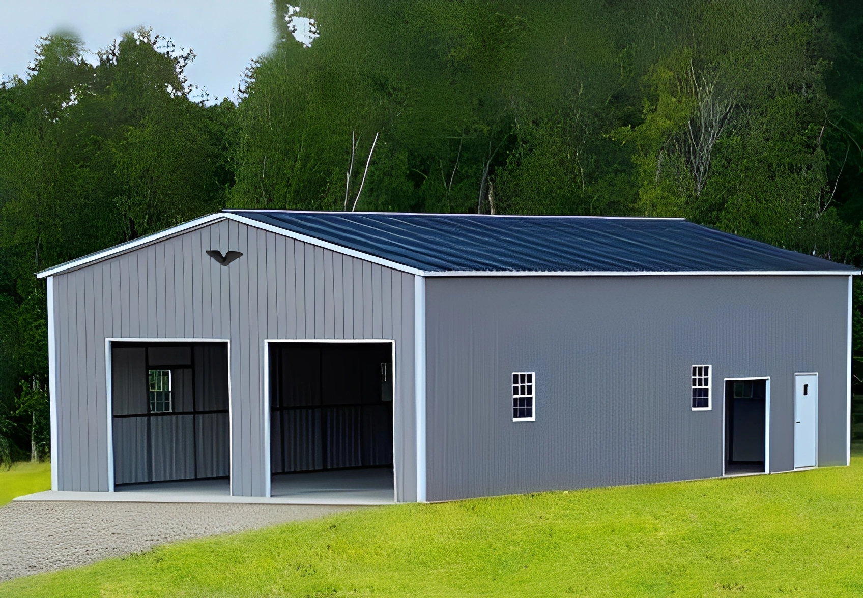Steel building on a grassy lawn