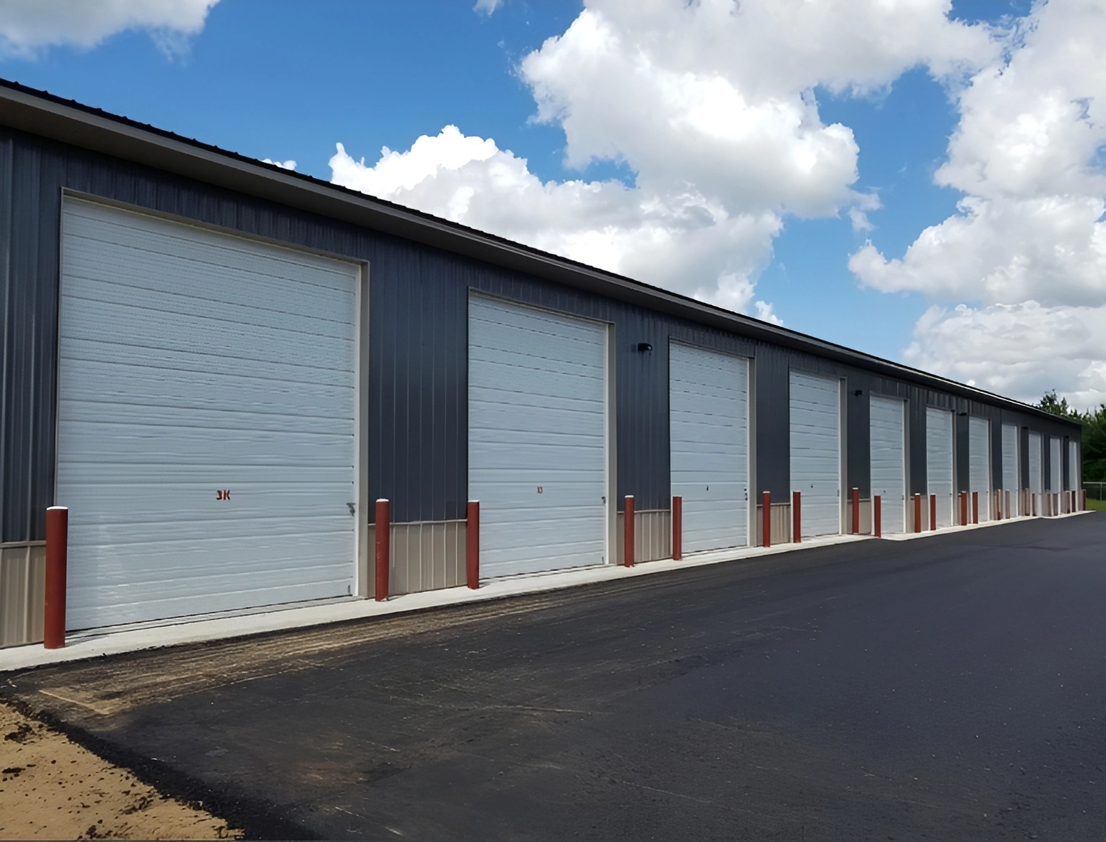 Blue building with overhead garage doors