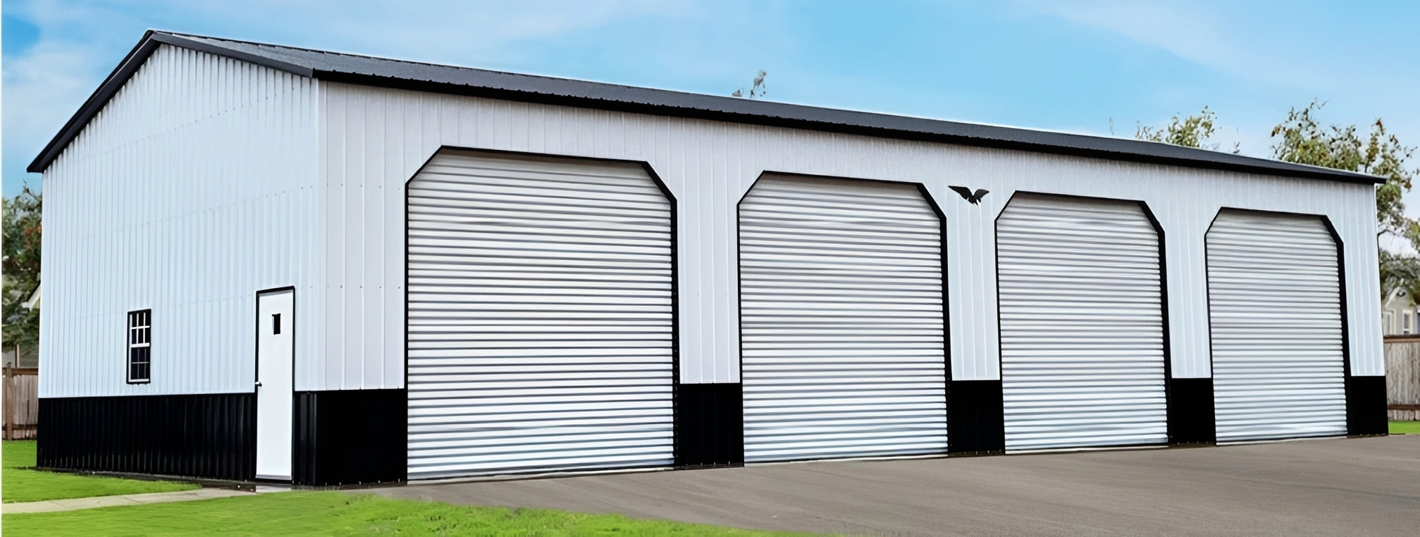 Metal building with four garage doors