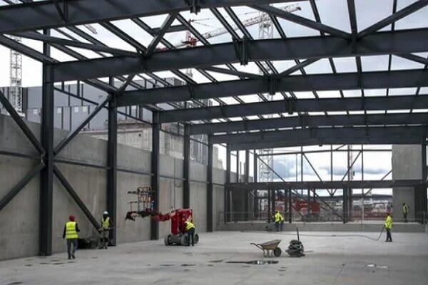 Industrial site under construction with workers