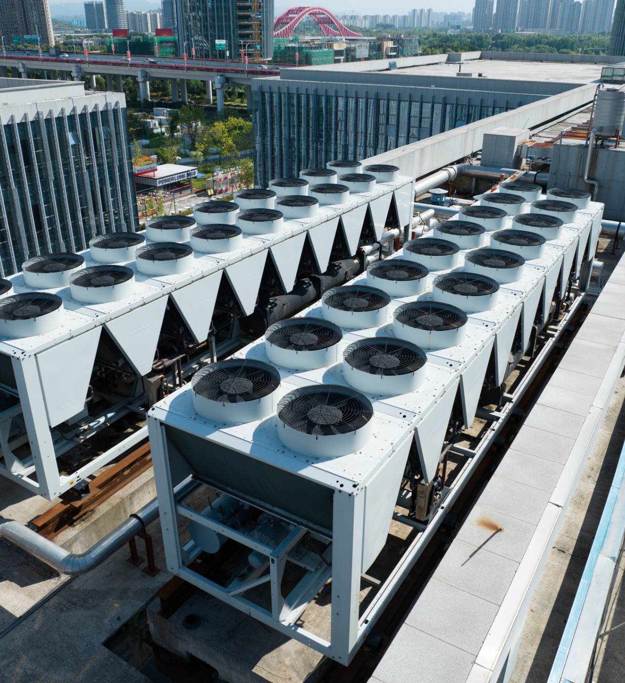 Rooftop industrial air conditioning units in city.