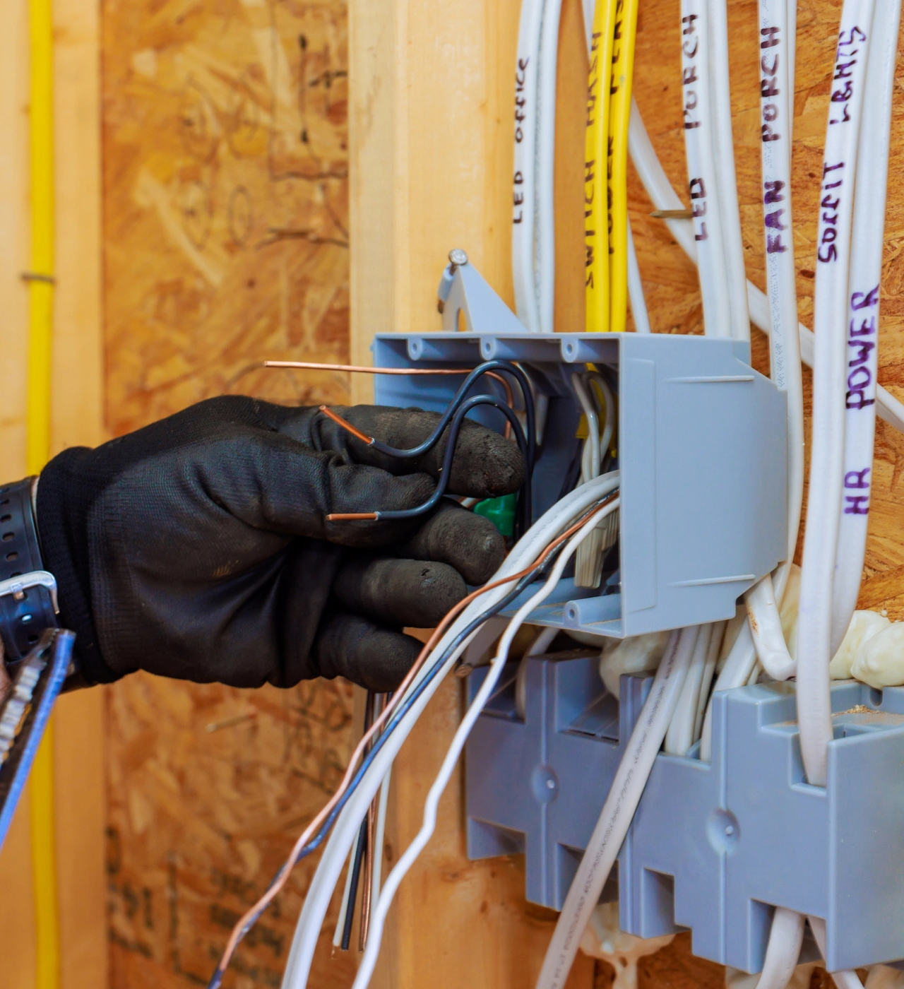 Electrician working on a wiring installation.