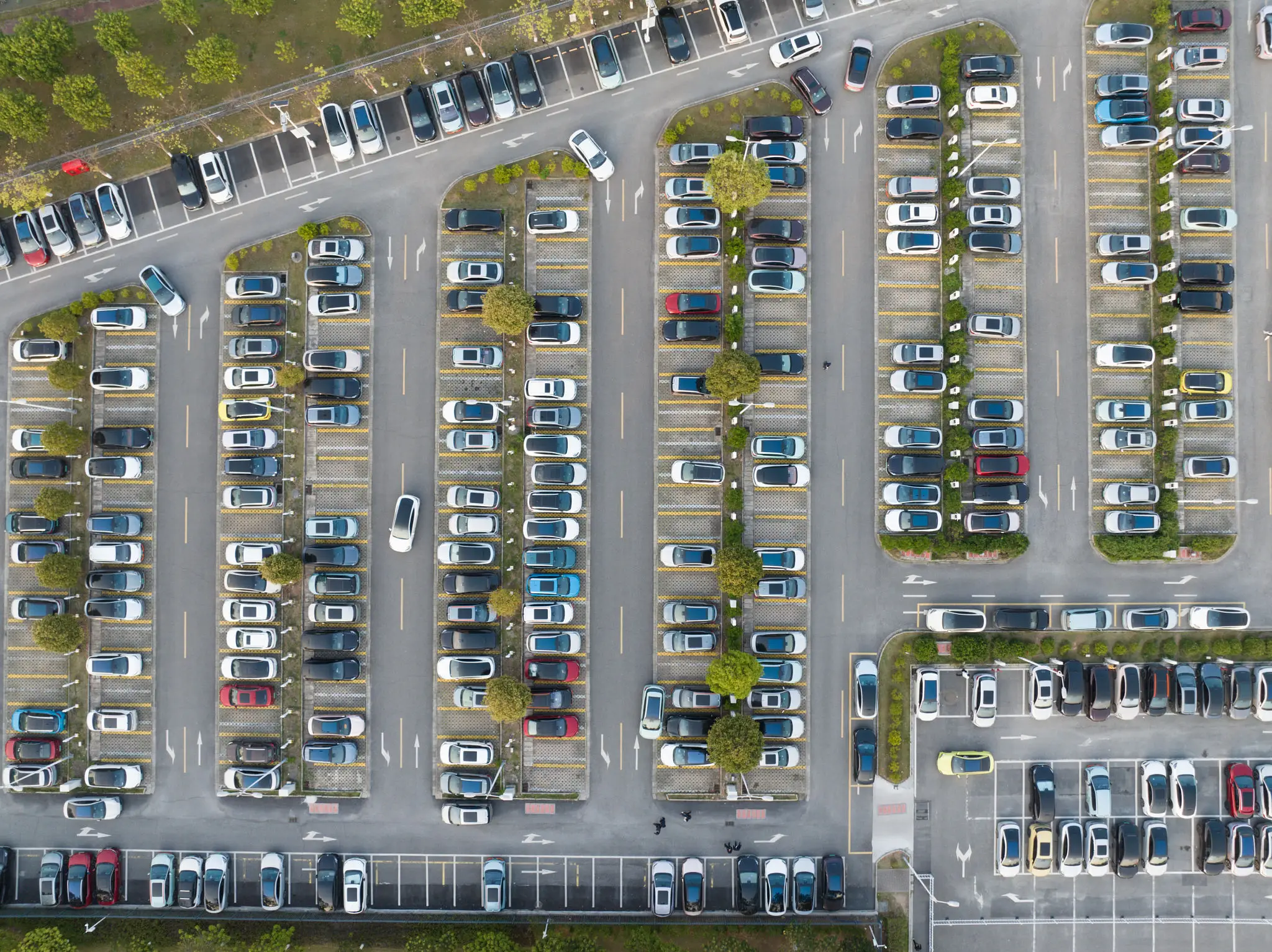 Aerial view of a crowded parking lot.