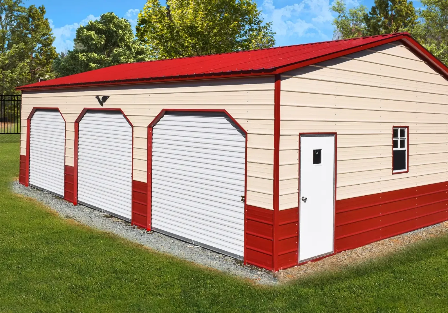 Red and white garage with three doors.