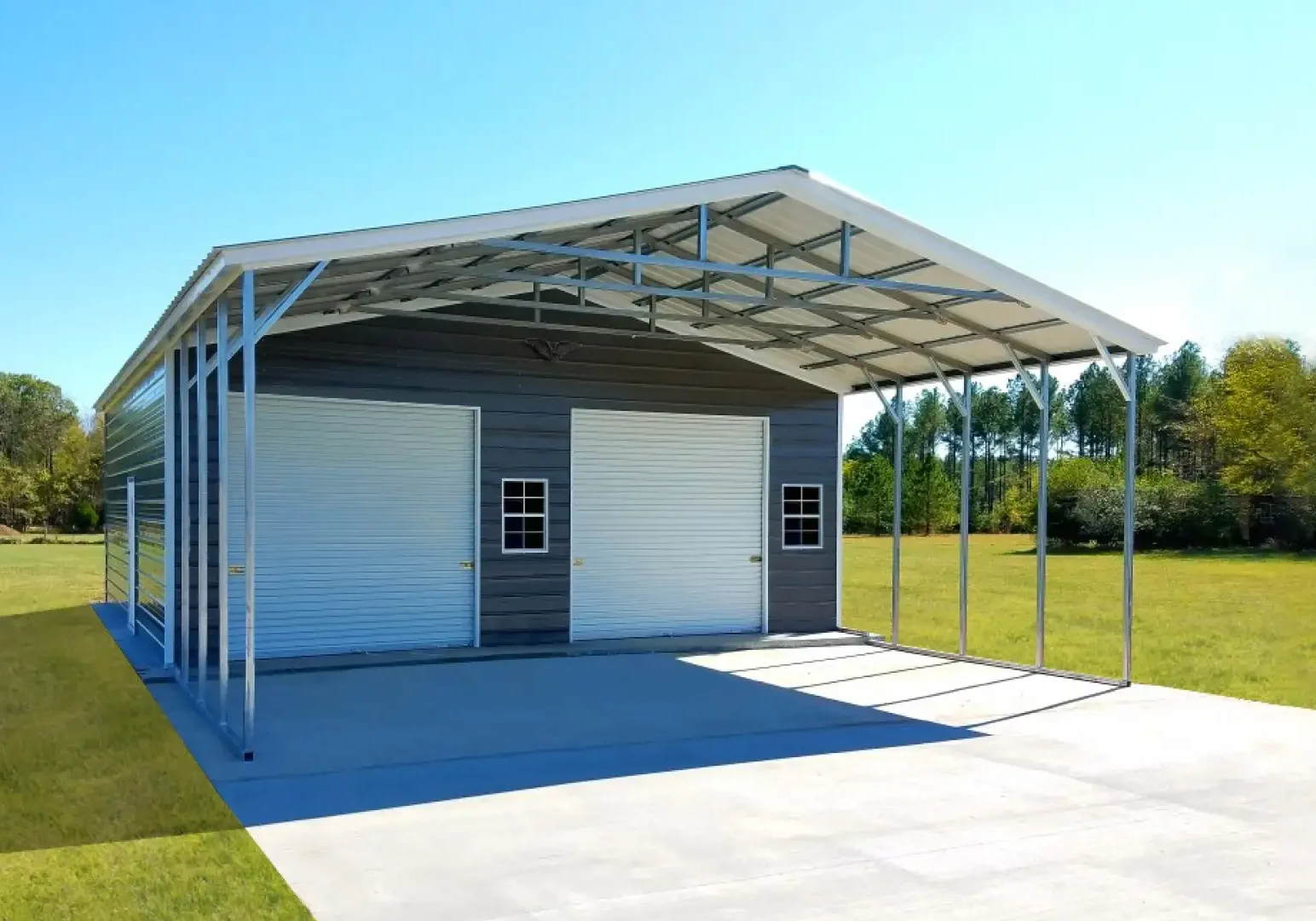 Metal garage building with two roll-up doors.