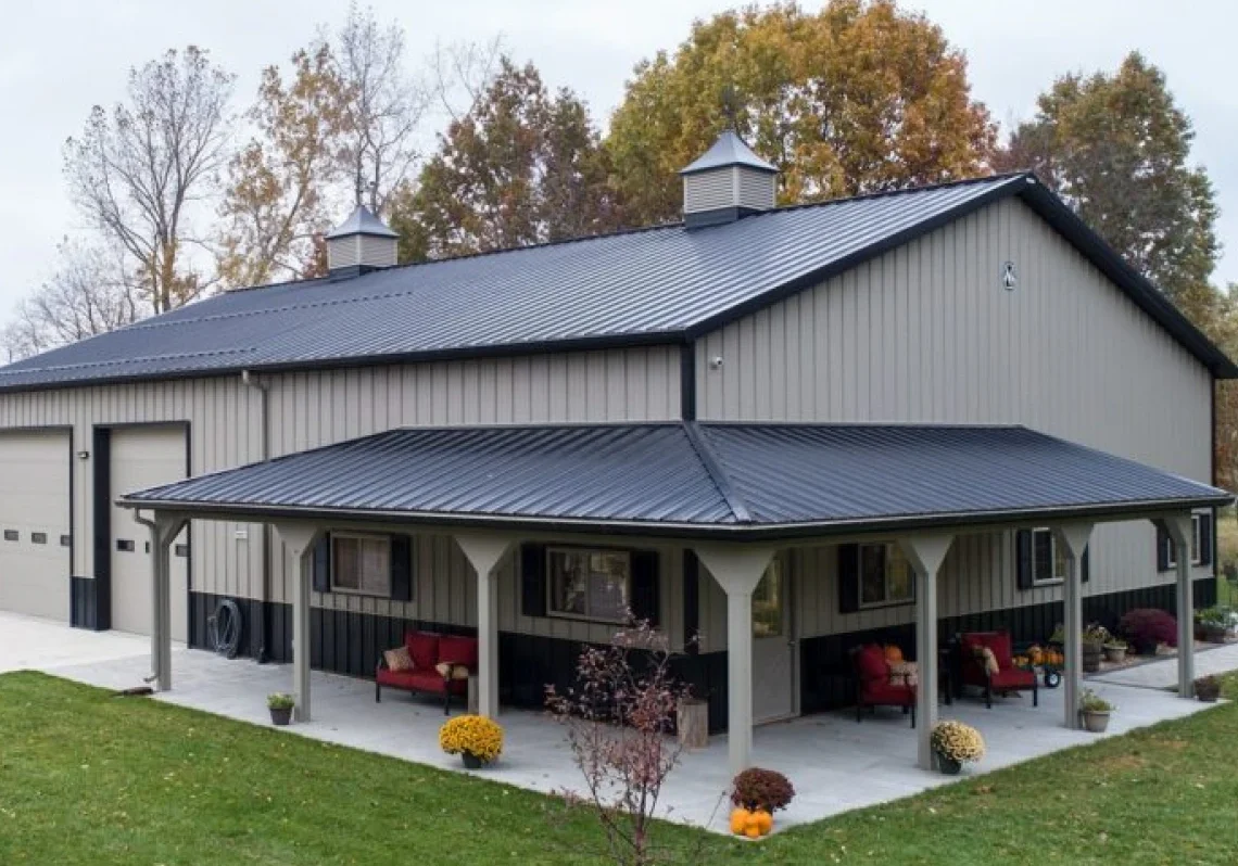 Barn house surrounded by autumn trees