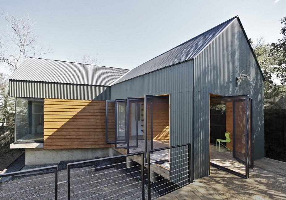 Contemporary home with open doors and patio